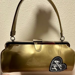 NWT! Sourpuss Betty Page Gold Rockabilly bag.